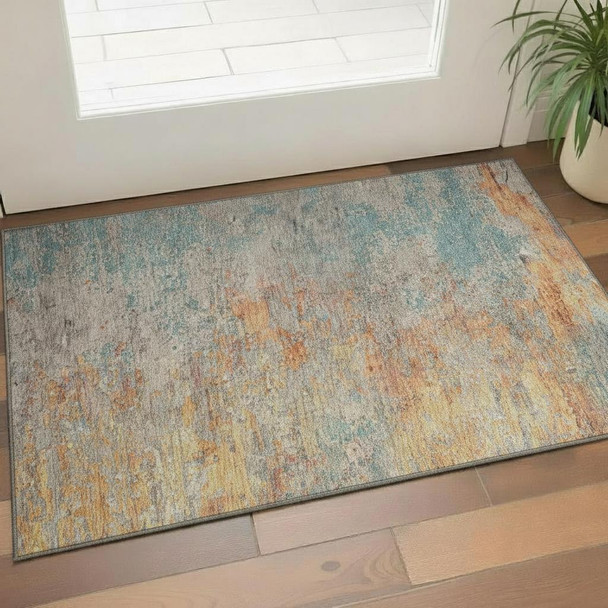 3' X 5' Teal Peach And Gold Abstract Washable Area Rug With UV Protection