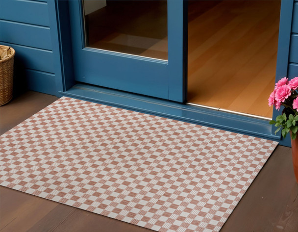3' X 5' Salmon And Cream Geometric Indoor Outdoor Area Rug