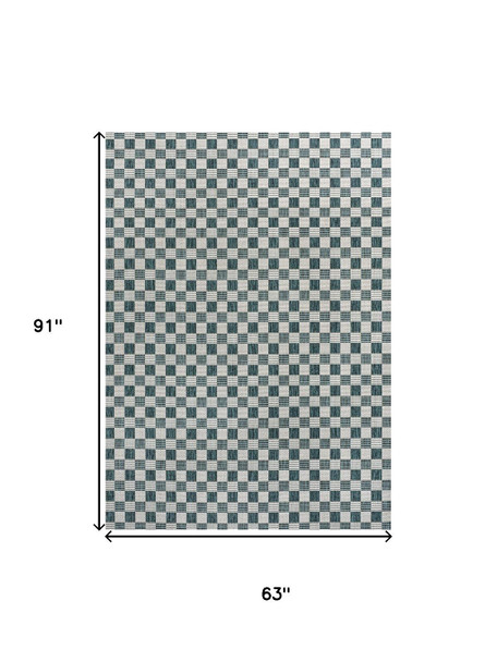 5' X 8' Turquoise And Cream Geometric Indoor Outdoor Area Rug