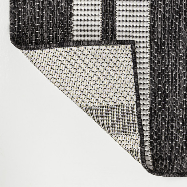 5' X 8' Black And Cream Geometric Indoor Outdoor Area Rug