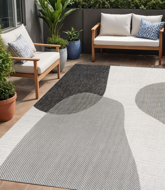5' X 8' Cream And Black Geometric Indoor Outdoor Area Rug