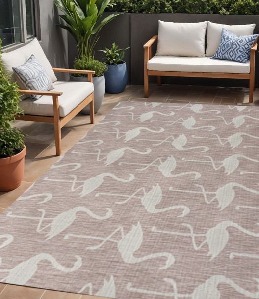 5' X 8' Pink And Cream Animal Print Indoor Outdoor Area Rug