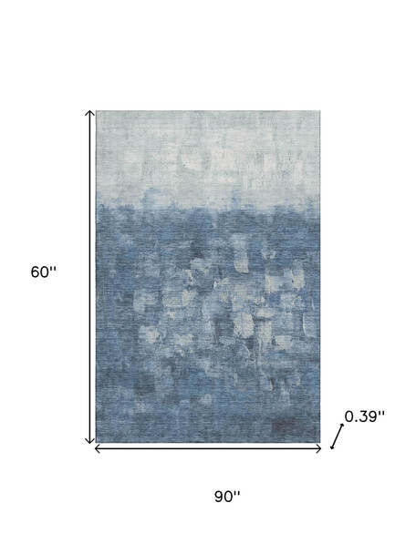 5' X 8' Navy Blue And Ivory Abstract Washable Area Rug With UV Protection
