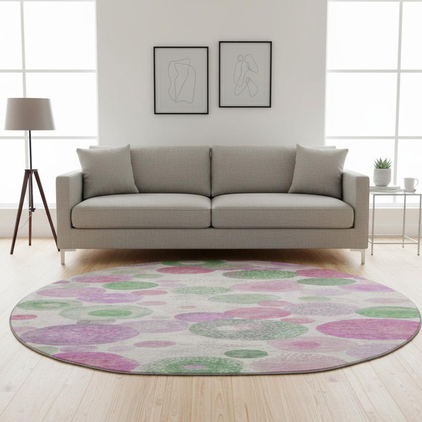 8' Pink Green And Ivory Geometric Washable Round Rug With UV Protection