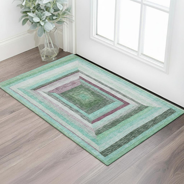 3' X 5' Teal Mauve And Ivory Geometric Washable Area Rug With UV Protection