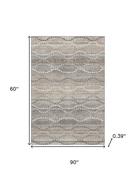5' X 8' Beige And Ivory Abstract Geometric Washable Area Rug With UV Protection