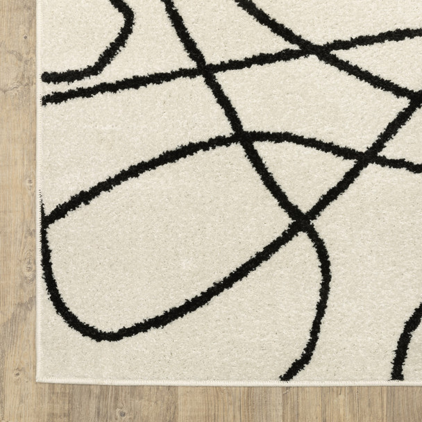 7' Beige And Black Abstract Runner Rug