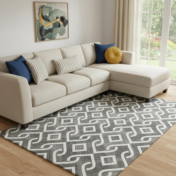 10' X 14' Black And Ivory Geometric Washable Area Rug With UV Protection