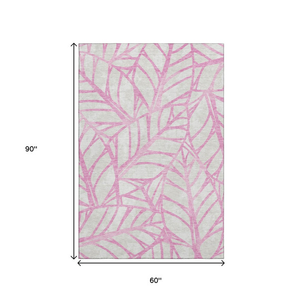 5' X 8' Pink And Beige Floral Washable Area Rug With UV Protection