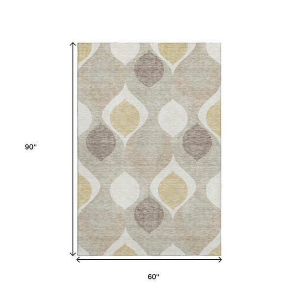 5' X 8' Beige Ivory And Gold Ogee Washable Area Rug With UV Protection