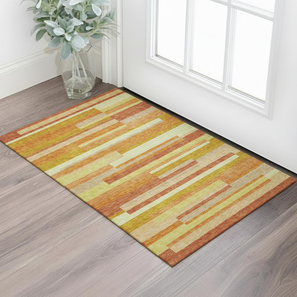 3' X 5' Orange And Gold Striped Washable Area Rug With UV Protection