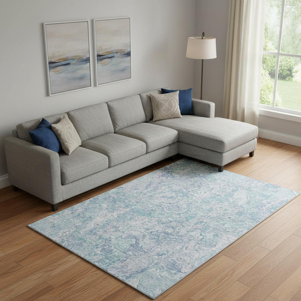 9' X 12' Sky Blue And Ivory Abstract Washable Area Rug With UV Protection