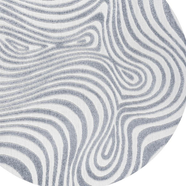 8' Light Blue And Ivory Round Abstract Indoor Outdoor Area Rug