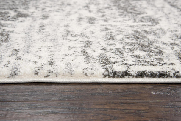 5' X 8' Ivory Silver And Taupe Abstract Area Rug