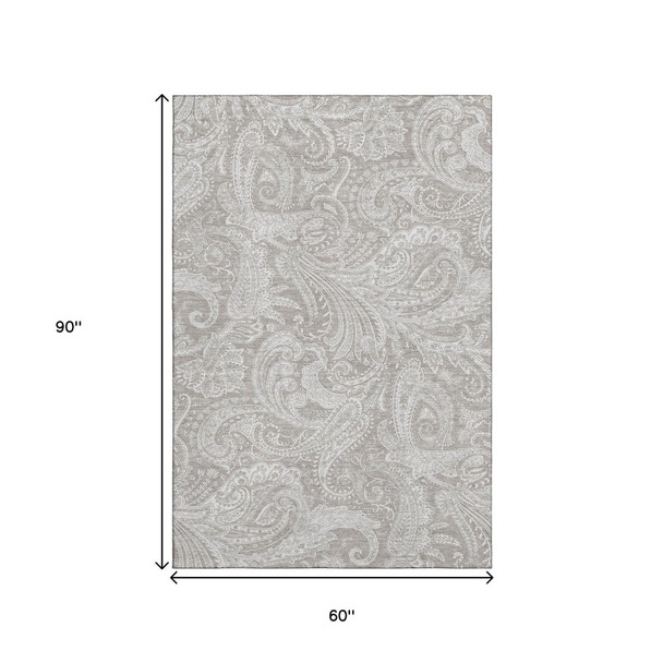 5' X 8' Taupe And Ivory Paisley Washable Area Rug With UV Protection