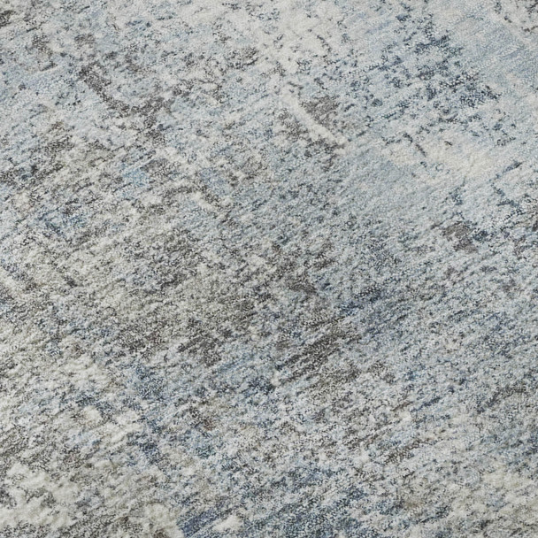 8' X 10' Blue And Ivory Abstract Washable Area Rug With UV Protection