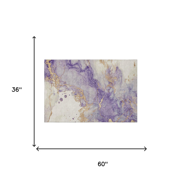 3' X 5' Purple Gold And Ivory Abstract Washable Area Rug With UV Protection