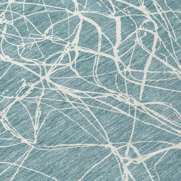 8' X 10' Teal Blue And Ivory Abstract Washable Indoor Outdoor Area Rug