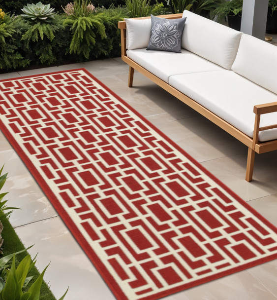 2' X 8' Red and Ivory Geometric Stain Resistant Indoor Outdoor Area Rug