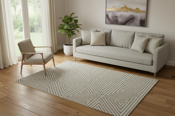 5' X 8' Tan And Ivory Wool Geometric Hand Woven Area Rug With Fringe