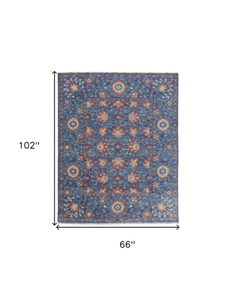 5' X 8' Blue And Red Wool Floral Hand Knotted Stain Resistant Area Rug