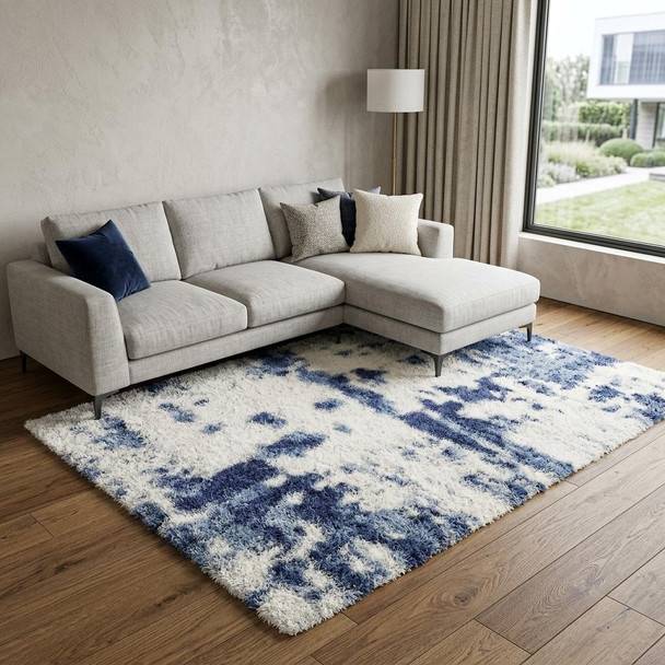 8' X 10' Blue and Ivory Abstract Power Loom Area Rug