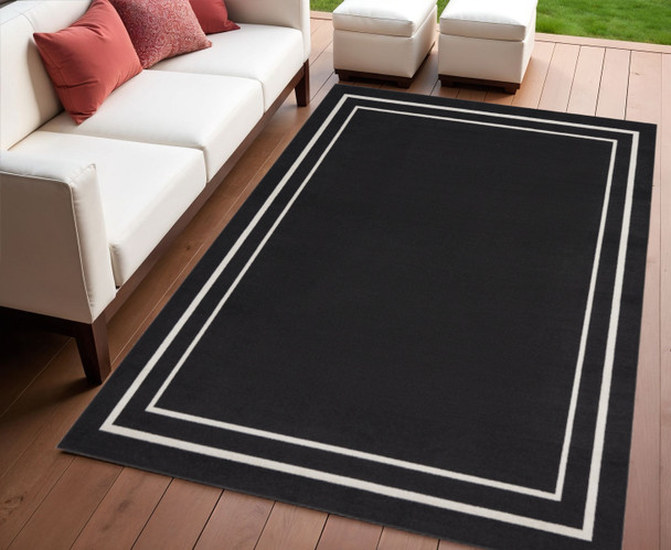 4' X 6' Black And Ivory Indoor Outdoor Area Rug