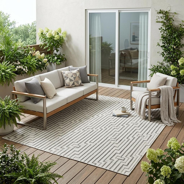 5' X 7' Cream and Beige Geometric Distressed Indoor Outdoor Area Rug