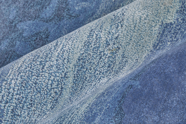 2' X 3' Blue and Ivory Abstract Hand Tufted Area Rug