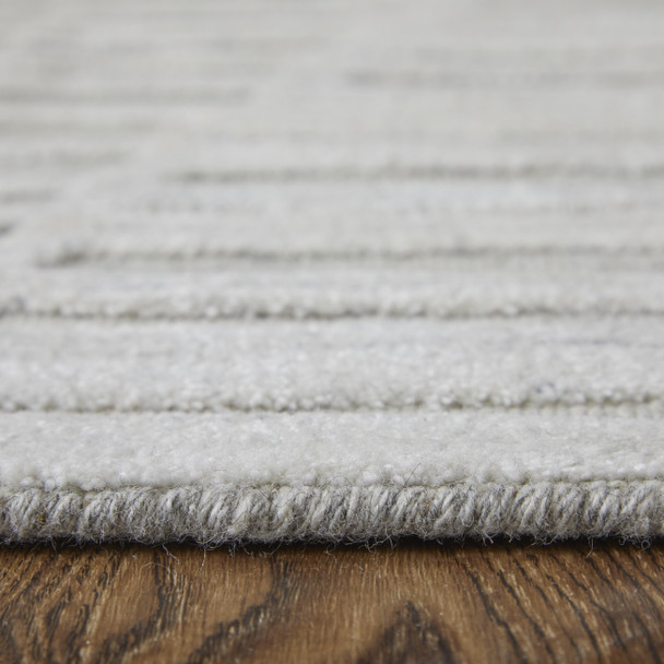 8' X 10' Ivory And Tan Geometric Hand Woven Area Rug