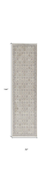 12' Gray and Ivory Oriental Power Loom Worn Faded Runner Rug With Fringe