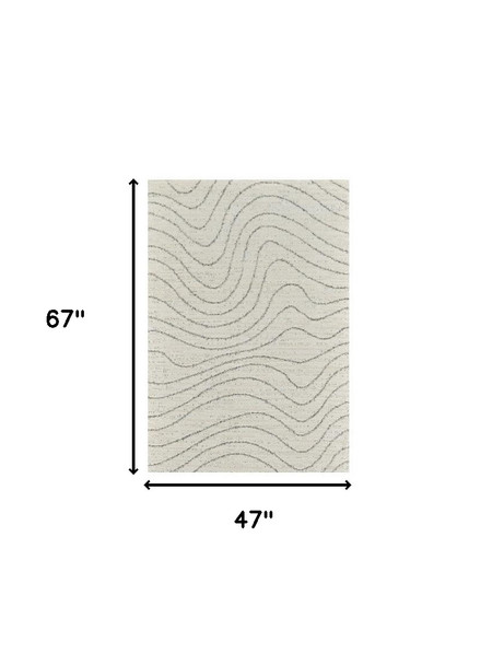 4' X 6' Cream and Beige Abstract Area Rug