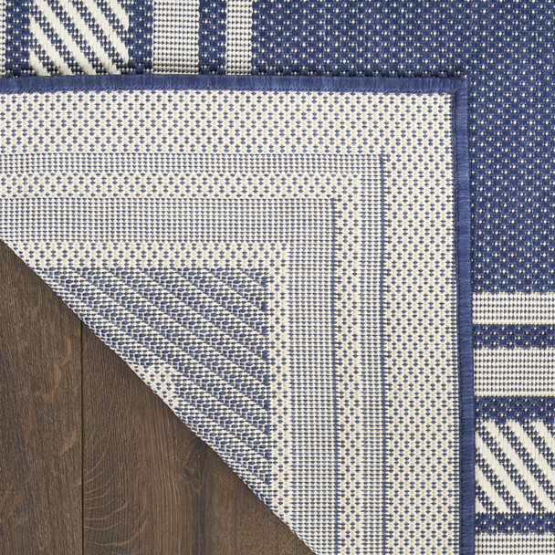 6' X 9' Navy Blue And Ivory Geometric Indoor Outdoor Area Rug