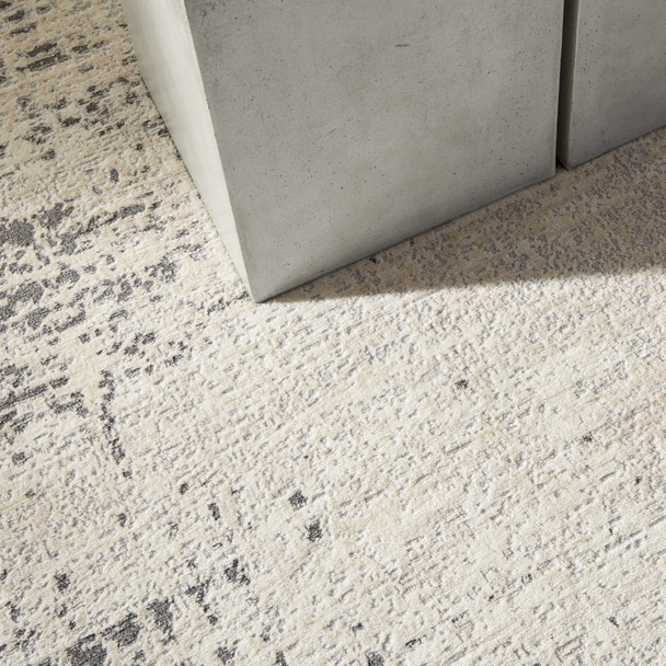 5' X 7' Ivory Abstract Area Rug
