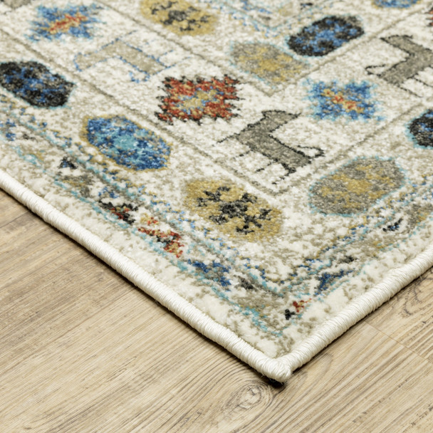 7' X 9' Ivory Tan And Gray Tribal Area Rug