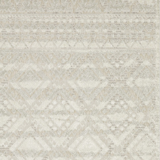 7' X 10' Beige And Ivory Tribal Area Rug