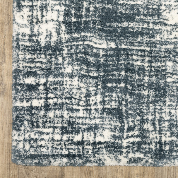 7' X 10' Gray And Ivory Geometric Area Rug