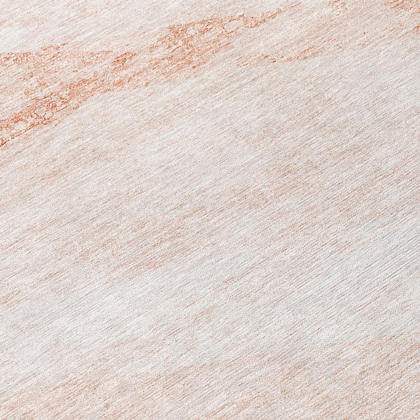 8' X 10' Salmon Peach And Ivory Abstract Washable Indoor Outdoor Area Rug