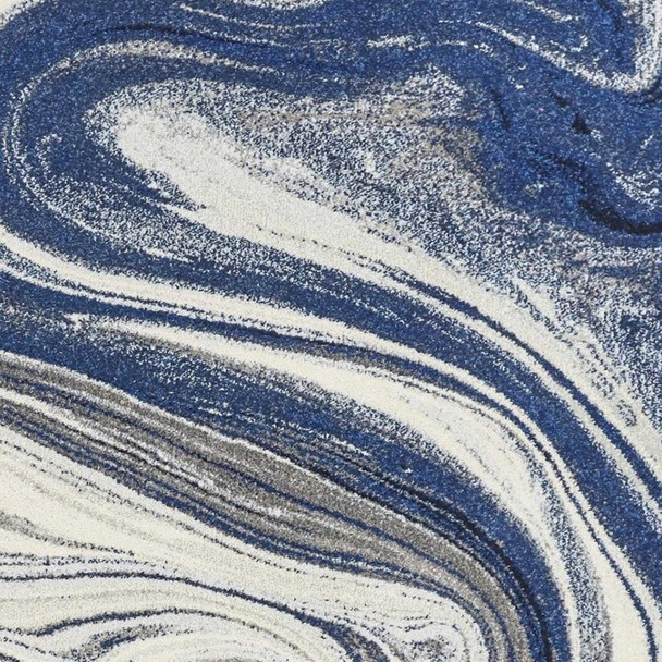 3' X 5' Blue And Beige Abstract Area Rug