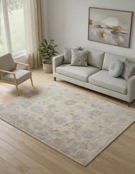 5' X 8' Tan Orange And Blue Floral Hand Knotted Stain Resistant Area Rug