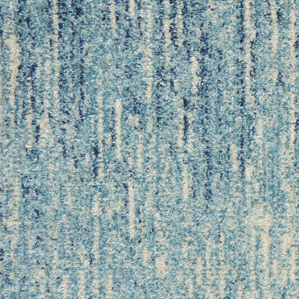 9' X 12' Blue and Ivory Abstract Power Loom Area Rug
