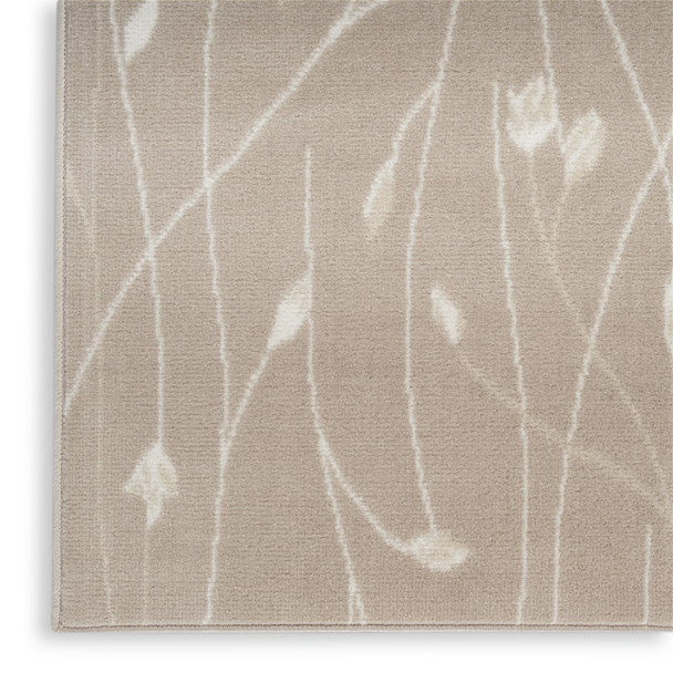8' X 10' Beige and Ivory Floral Power Loom Area Rug