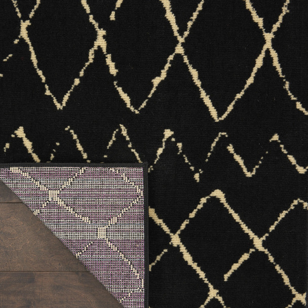 8' Black And Ivory Abstract Distressed Runner Rug