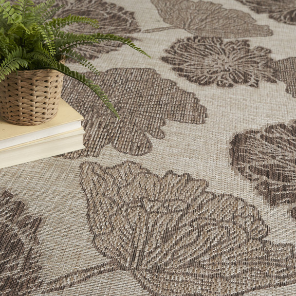 5' X 7' Natural And Ivory Floral Indoor Outdoor Area Rug