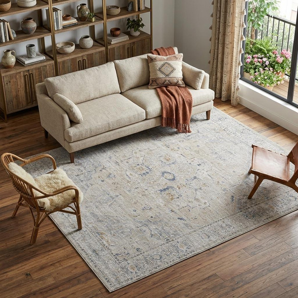 9' X 13' Ivory Taupe and Blue Oriental Power Loom Worn Faded Area Rug With Fringe