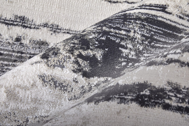2' X 3' Gray Ivory And Taupe Abstract Distressed Area Rug