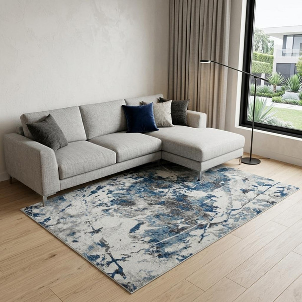 9' X 12' Ivory Teal And Black Abstract Area Rug