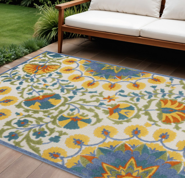 8' X 11' Ivory And Blue Floral Indoor Outdoor Area Rug