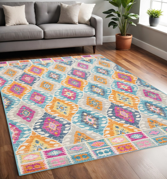 5' X 7' Gray Blue And Orange Ogee Distressed Area Rug