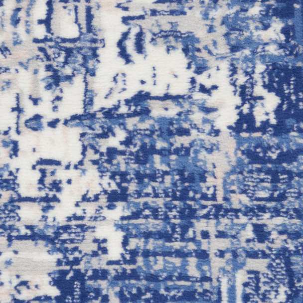 4' X 6' Blue And Ivory Abstract Distressed Area Rug